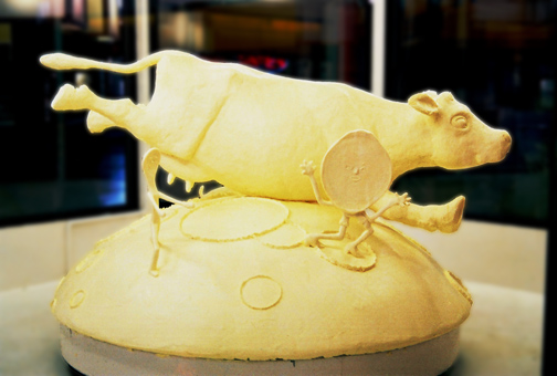 Cow jumps over the moon, in butter, by Jim Victor